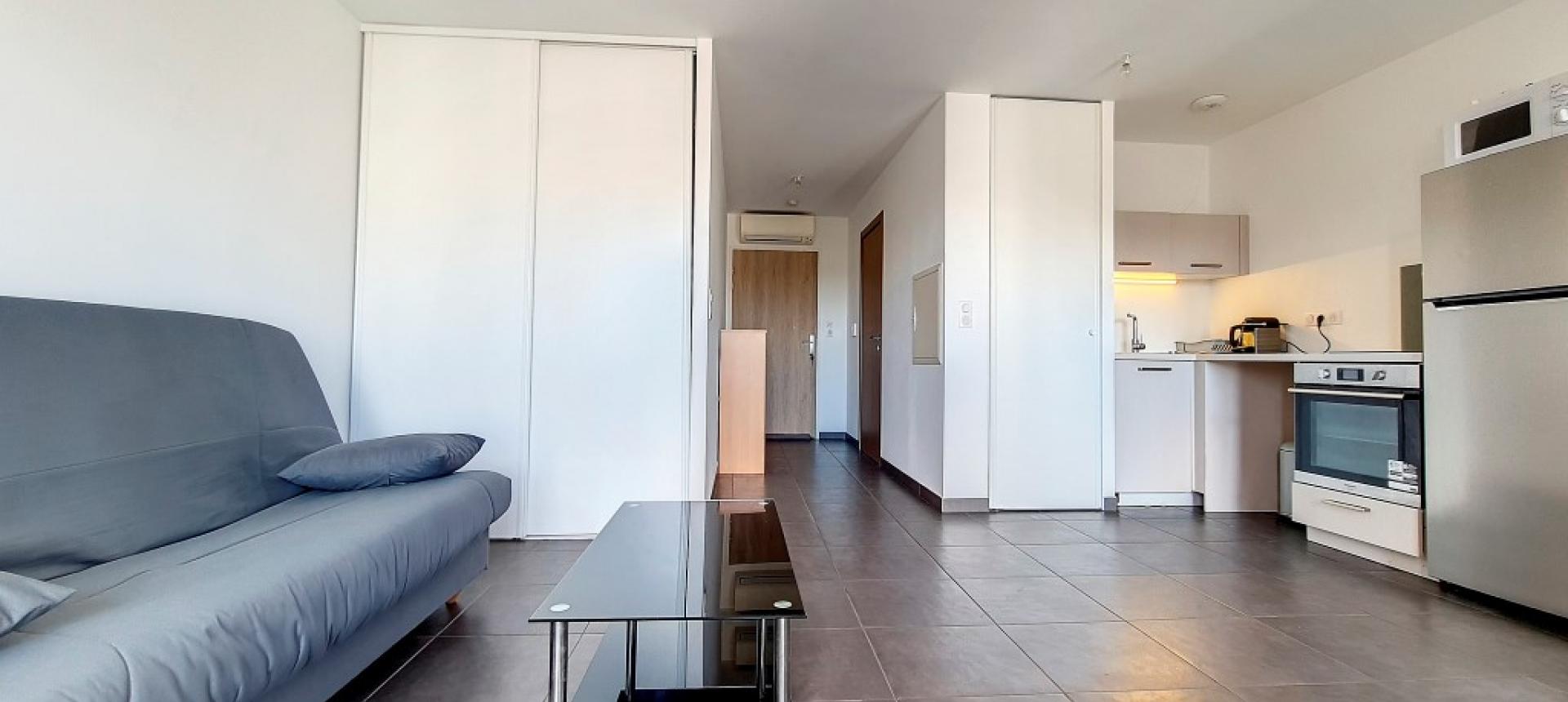 F1 meublé  à louer la Palmeraie pièce à vivre