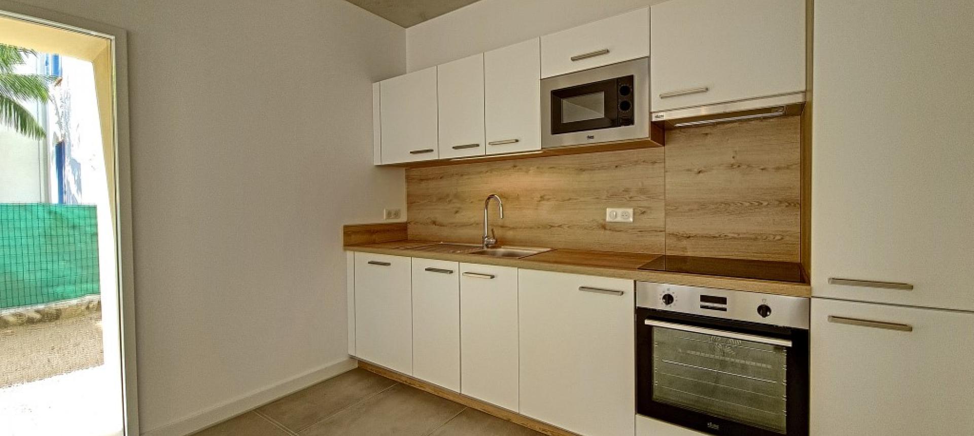 F3 à louer  Albert 1er Forcone  coin cuisine