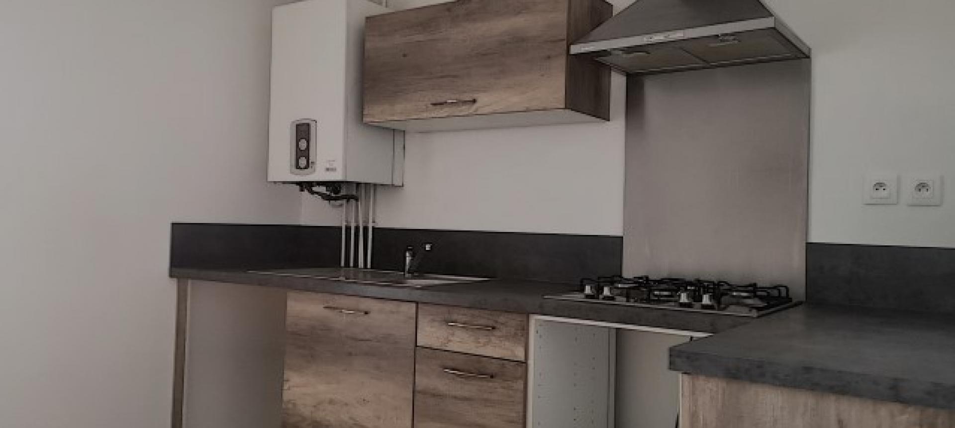 F3 à louer LA CLAIRIERE cuisine